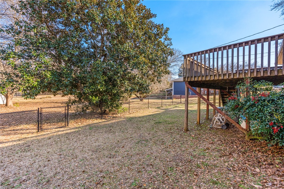 420 Brock Street Central, SC 29630 - Photo 39 of 45 This spacious yard offers a perfect canvas for outdoor living, complete with a private deck.
