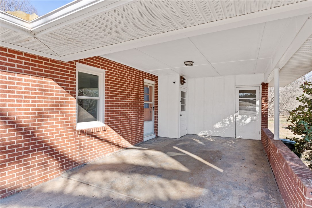 420 Brock Street Central, SC 29630 - Photo 4 of 45 This inviting patio area features durable brick and ample natural light, perfect for outdoor enjoyment.