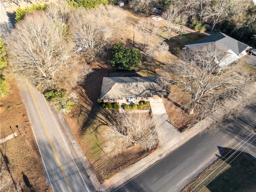 420 Brock Street Central, SC 29630 - Photo 41 of 45 An aerial view showcases the property, surrounded by mature trees, and an inviting pathway leading to the entrance.