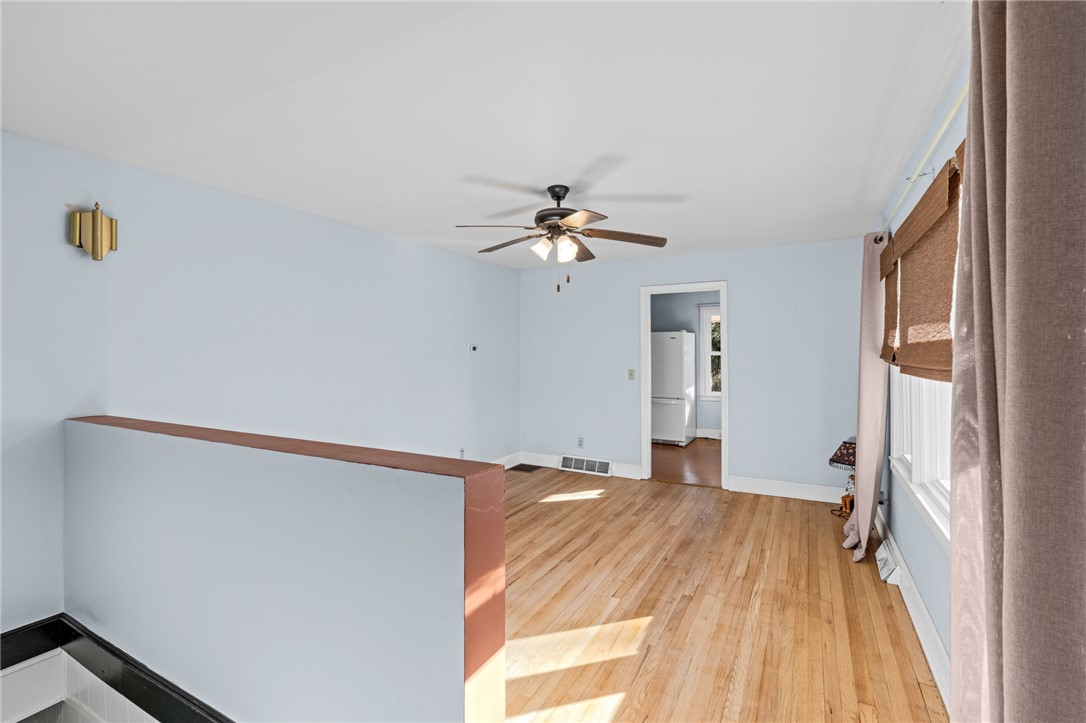 420 Brock Street Central, SC 29630 - Photo 7 of 45 This living area features polished hardwood floors, offering a bright and inviting space.