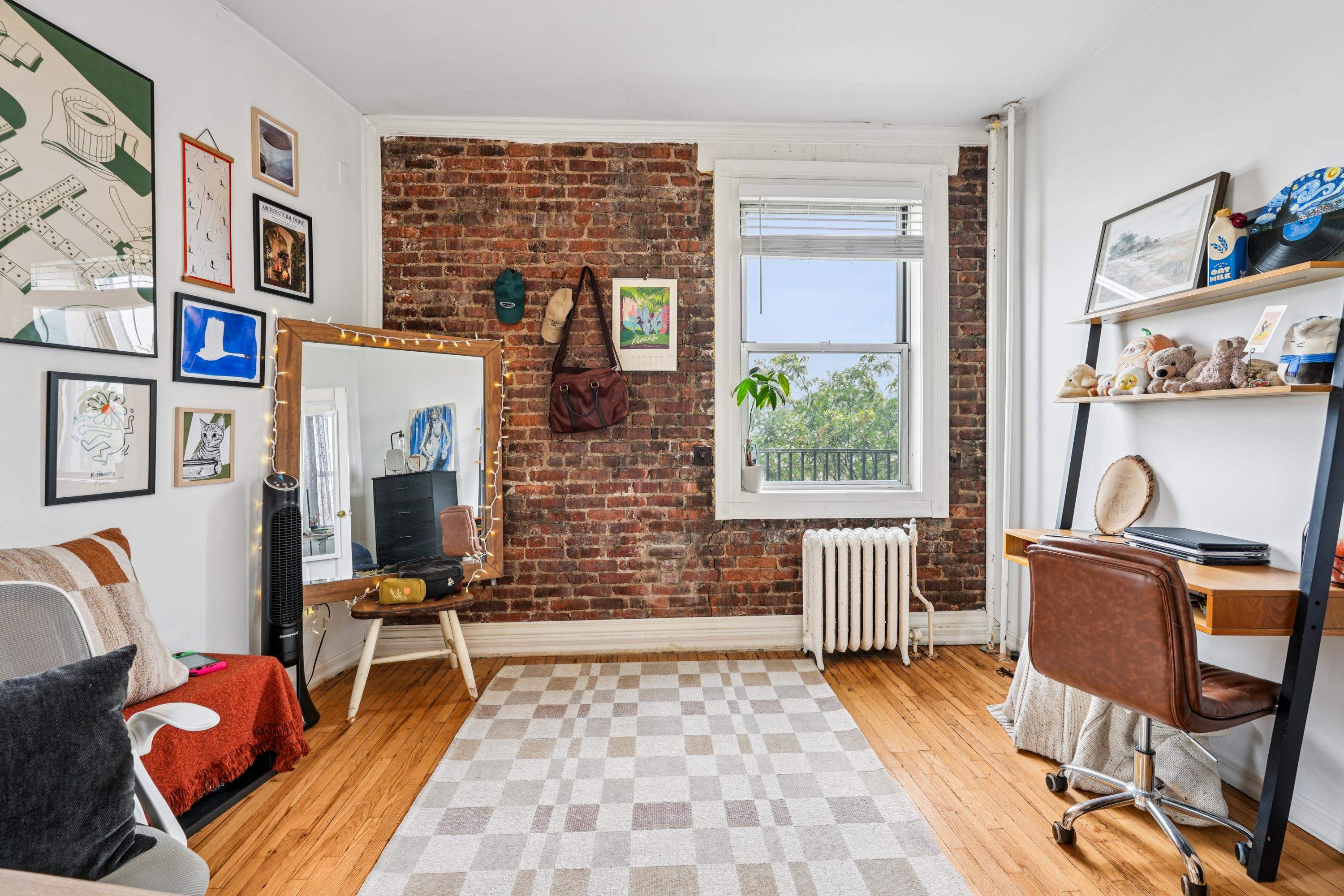 851 Boulevard East, Unit D2 Weehawken, NJ 07086 - Photo 24 of 42 a living room with furniture a rug and a window
