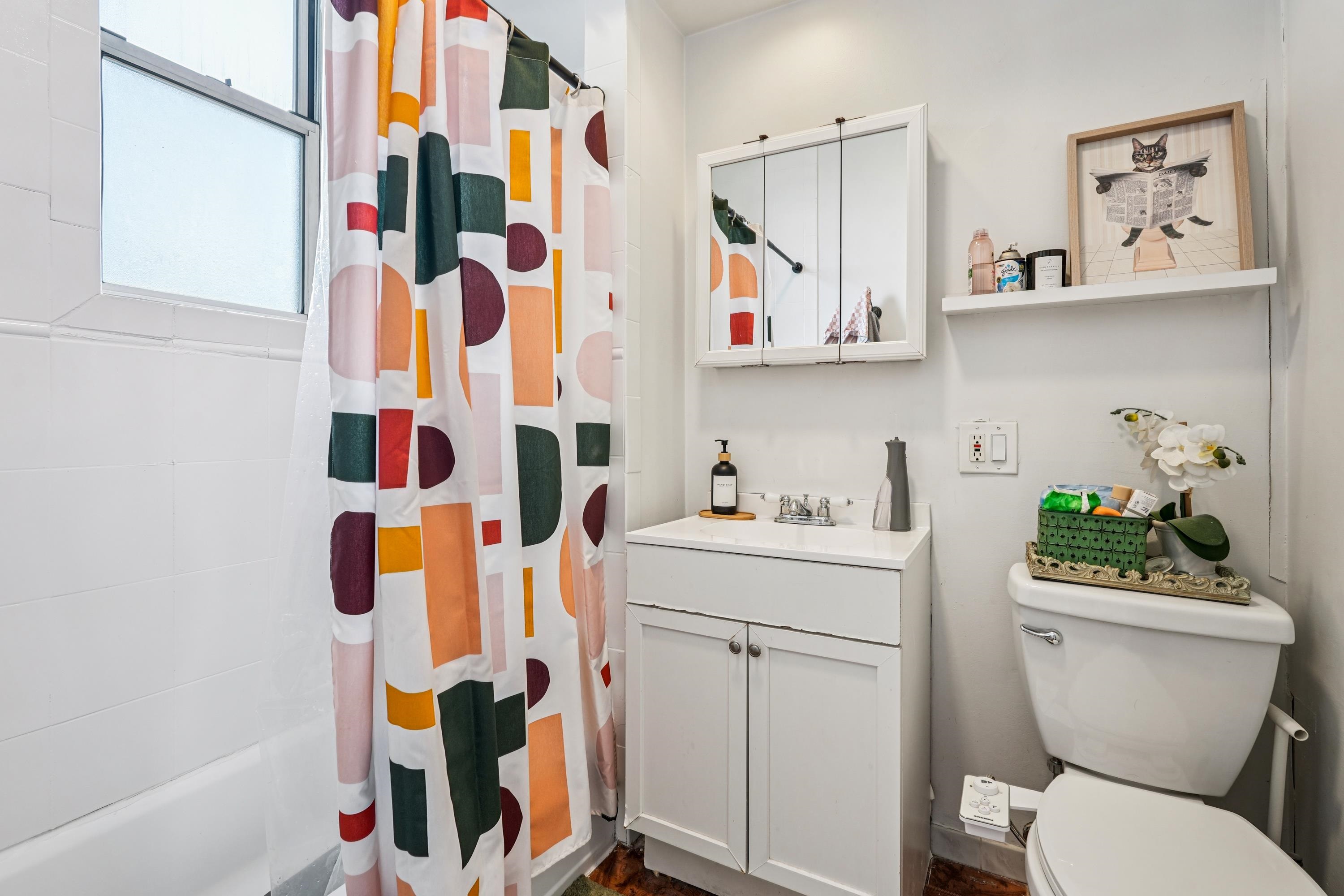 851 Boulevard East, Unit D2 Weehawken, NJ 07086 - Photo 27 of 42 a bathroom with a sink toilet and shower