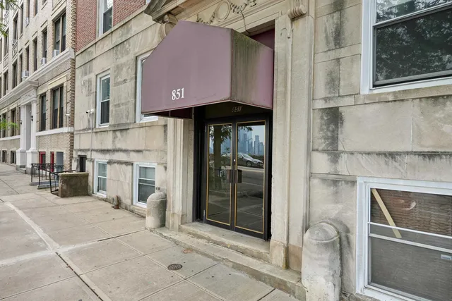 a front view of a building with glass door