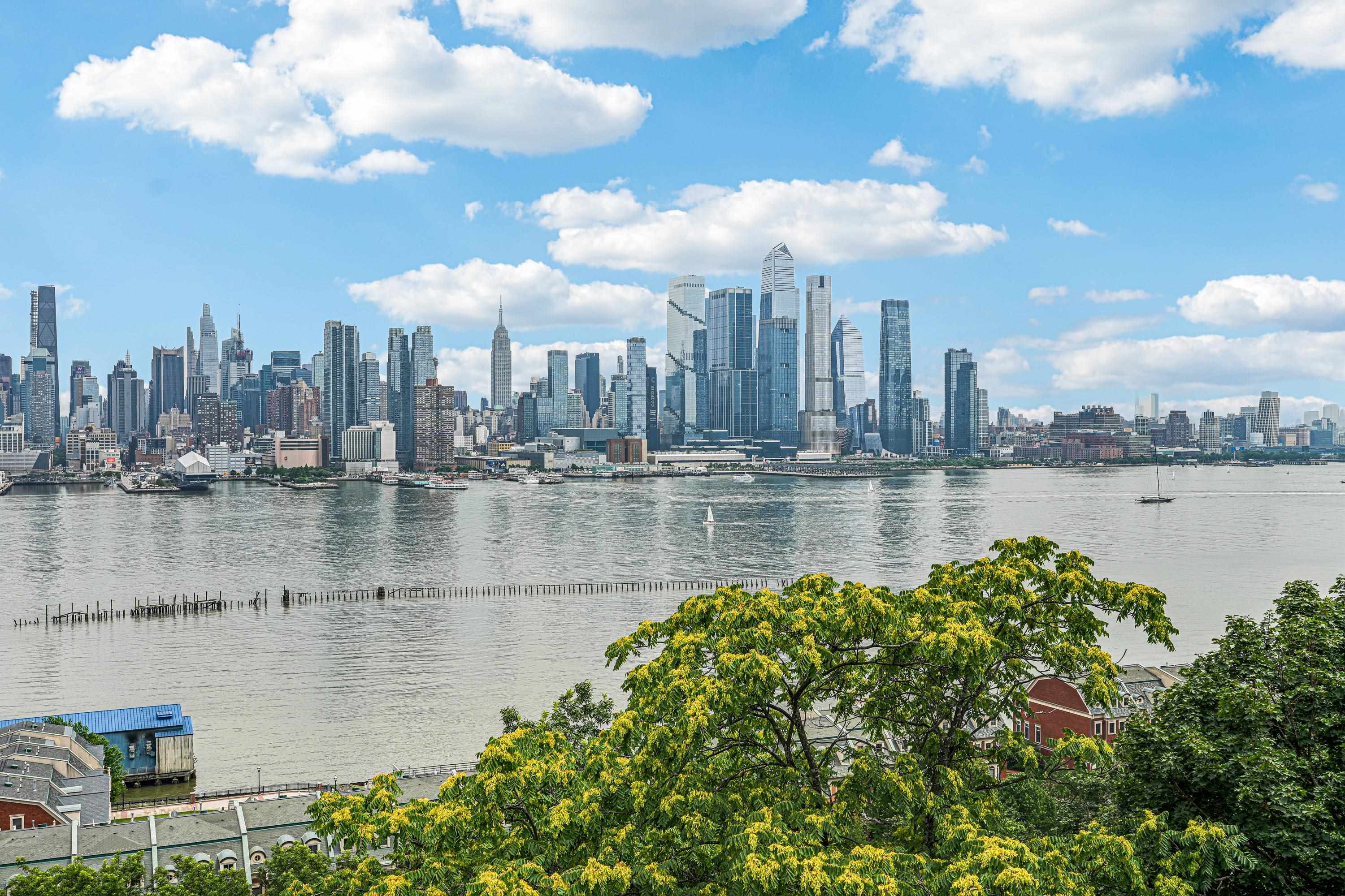 851 Boulevard East, Unit D2 Weehawken, NJ 07086 - Photo 39 of 42 a view of a lake with a city
