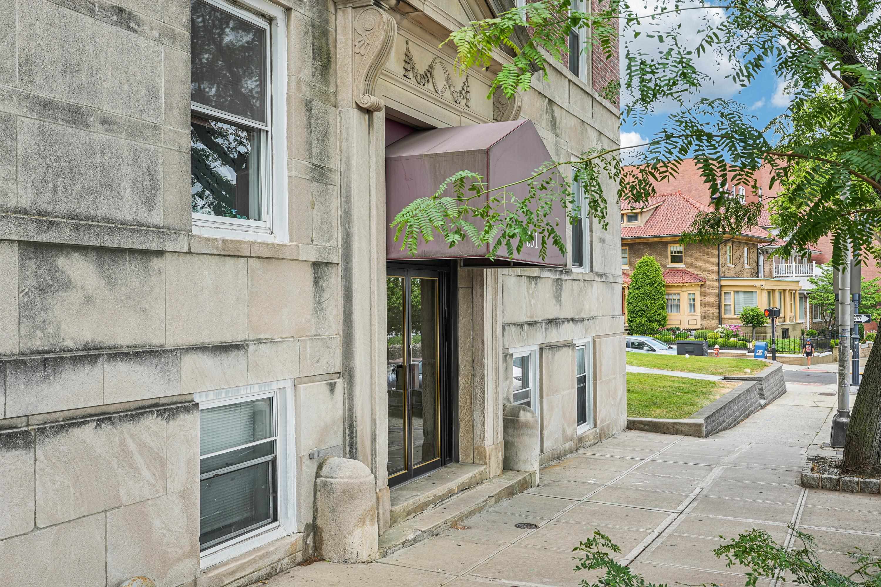 851 Boulevard East, Unit D2 Weehawken, NJ 07086 - Photo 4 of 42 a view of a brick house with a large windows