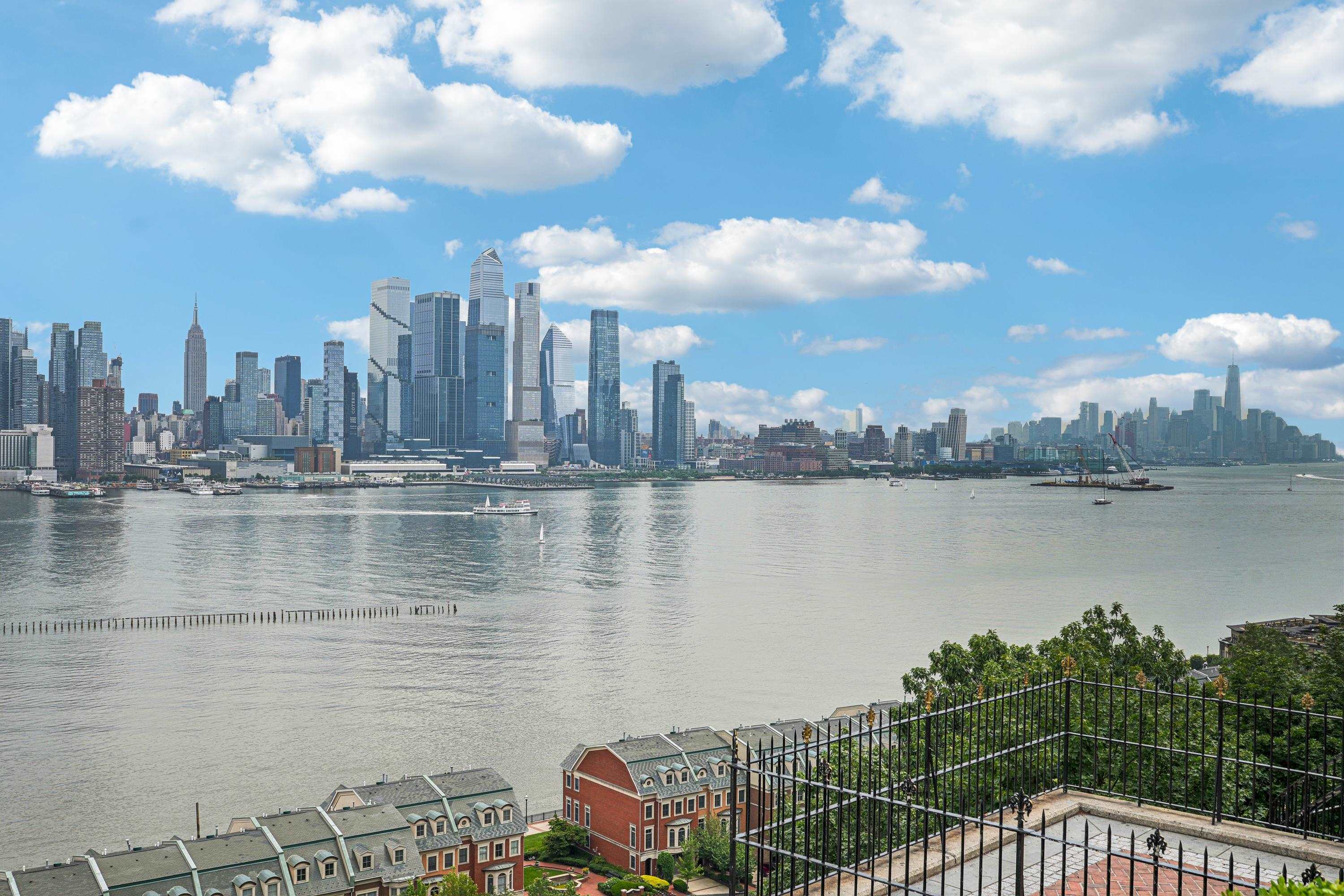 851 Boulevard East, Unit D2 Weehawken, NJ 07086 - Photo 41 of 42 a view of a lake and city