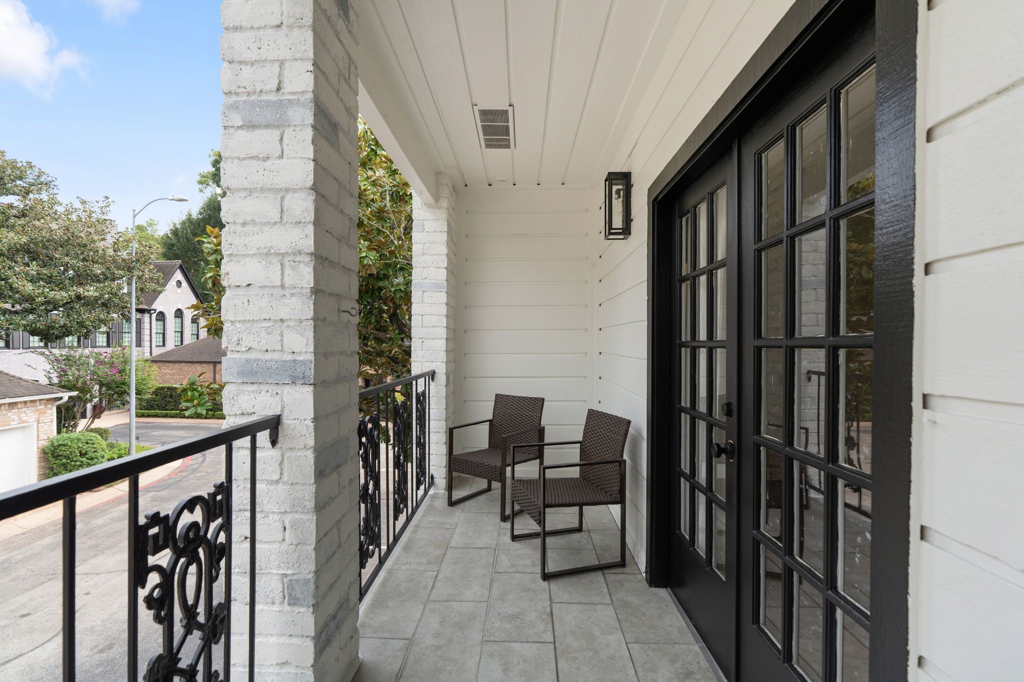 153 Sage Road Houston, TX 77056 - Photo 23 of 36 The private balcony off of the secondary bedroom #2. Great place to enjoy outside and quiet neighborhood.