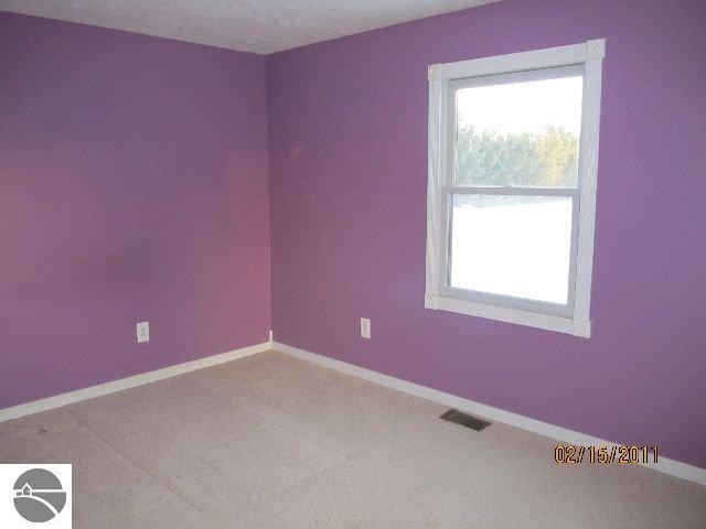 7034 Sullivan Road Grawn, MI 49637 - Photo 8 of 17 1723752-7.JPG