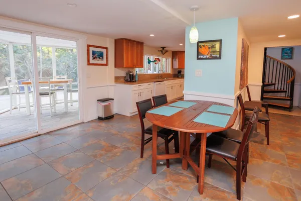 a kitchen with stainless steel appliances granite countertop a sink and a counter space