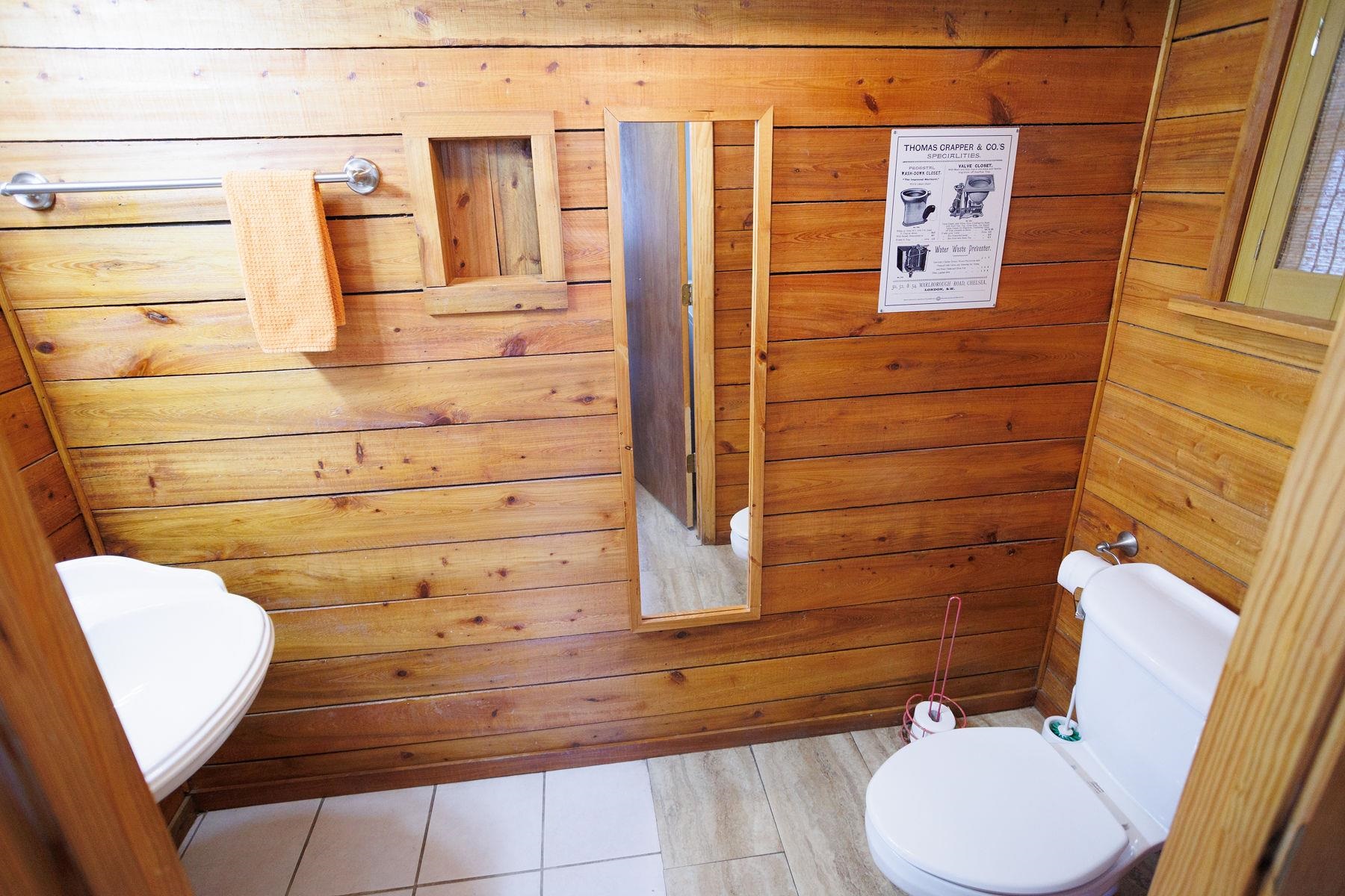 6194 Bear Trail Weeki Wachee, FL 34607 - Photo 22 of 68 a bathroom with a toilet and a shower