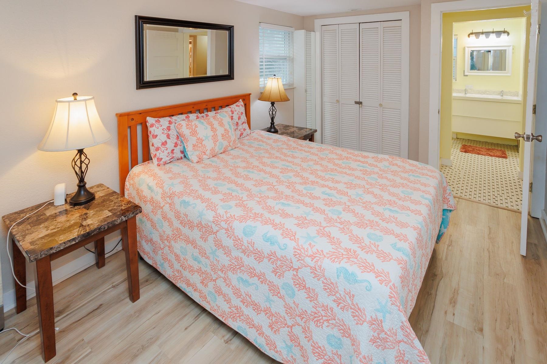 6194 Bear Trail Weeki Wachee, FL 34607 - Photo 33 of 68 a bedroom with a bed and a night stand