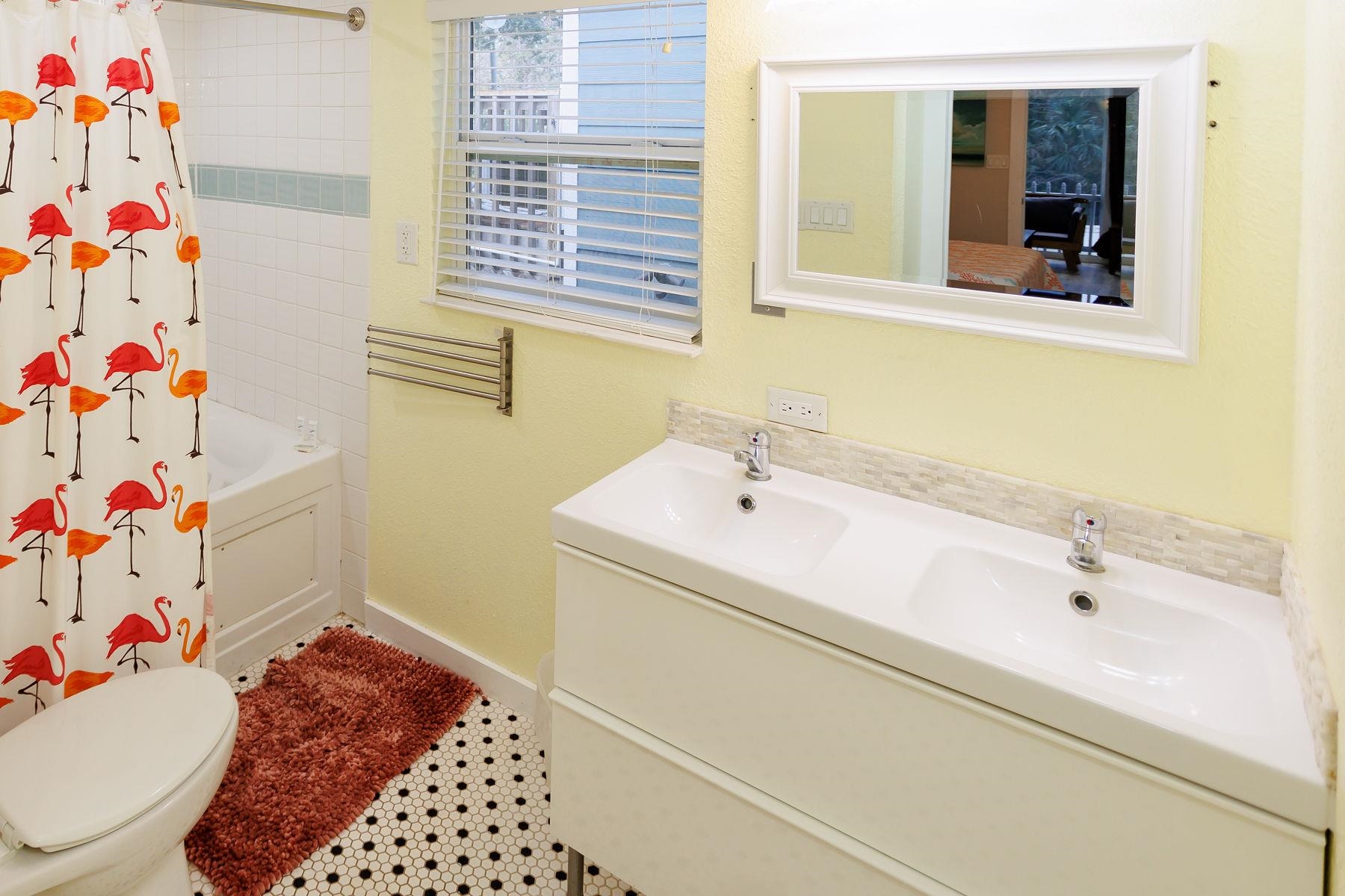 6194 Bear Trail Weeki Wachee, FL 34607 - Photo 34 of 68 a bathroom with a sink and a bathtub