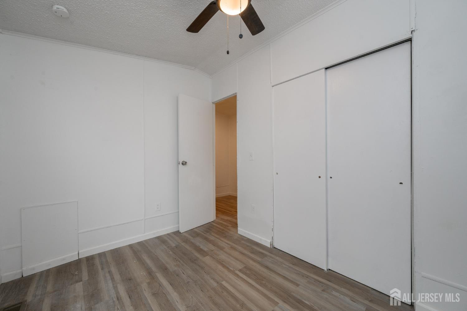448 Evergreen Road Millville, NJ 08332 - Photo 14 of 29 a view of an empty room and window chandelier fan