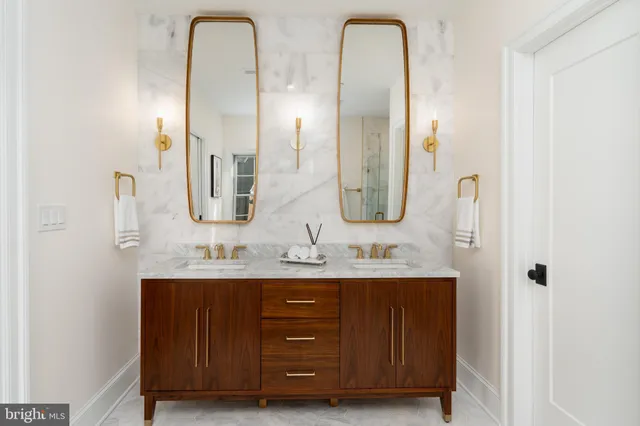 a living room with furniture fireplace and window