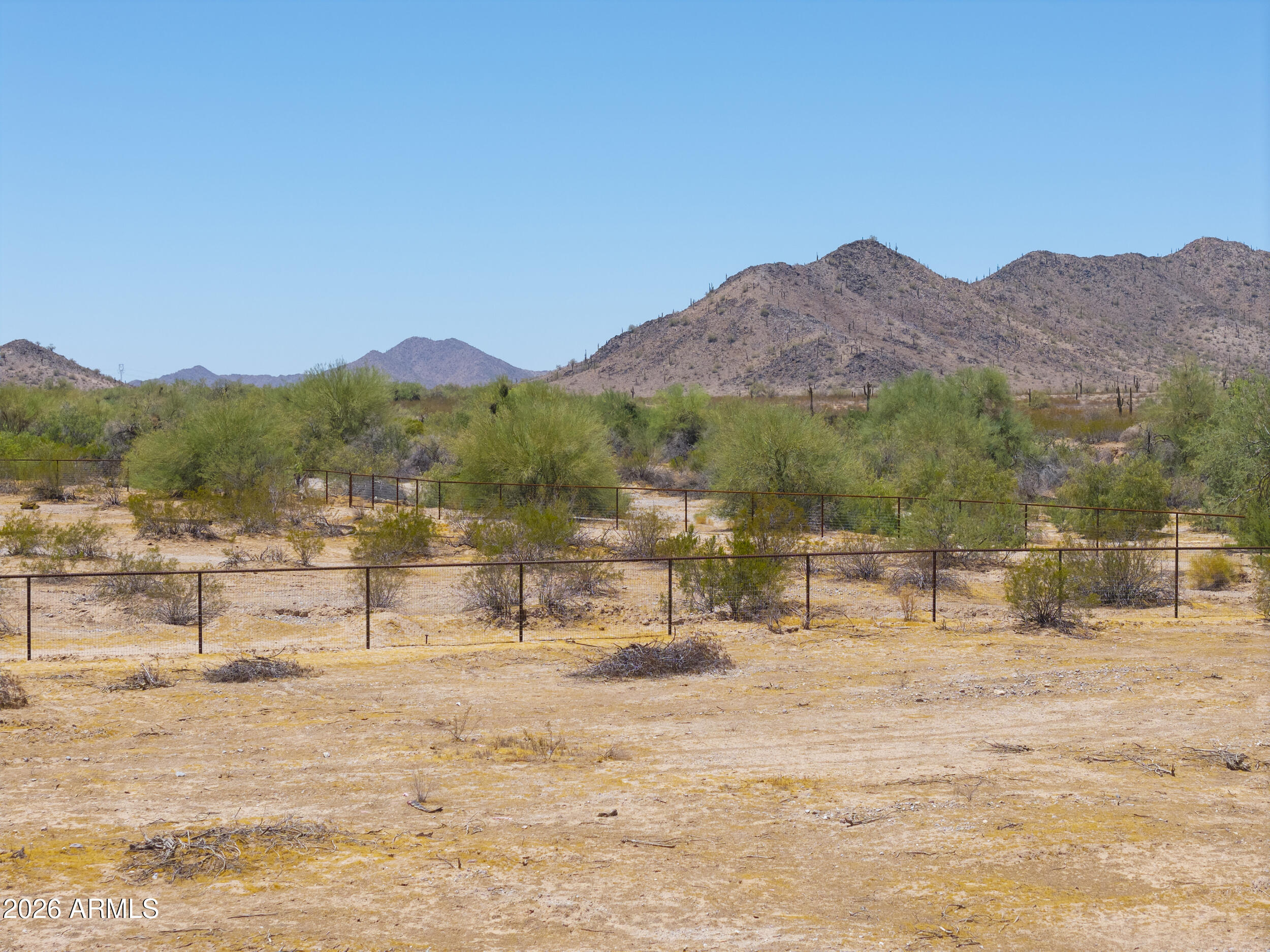 54650 West Ivory Road, Unit 57 Maricopa, AZ 85139 - Photo 13 of 17 a view of house with mountain view