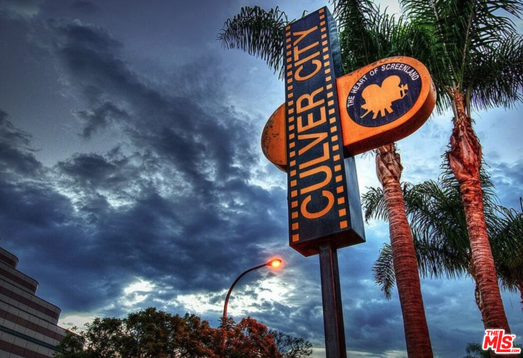 5922 Wrightcrest Drive Culver City, CA 90232 - Photo 25 of 25 a street sign on a wall next to a building