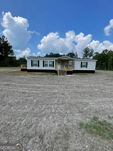 front view of house with a yard