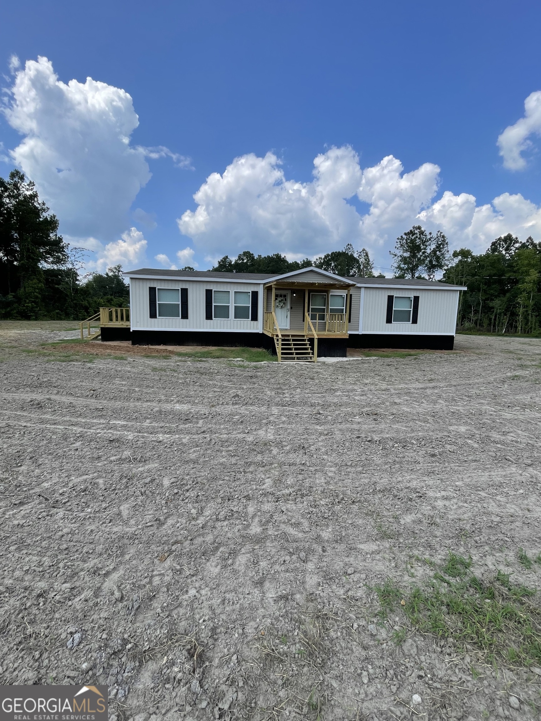 front view of house with a yard