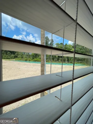 a view of a room with racks on the wall