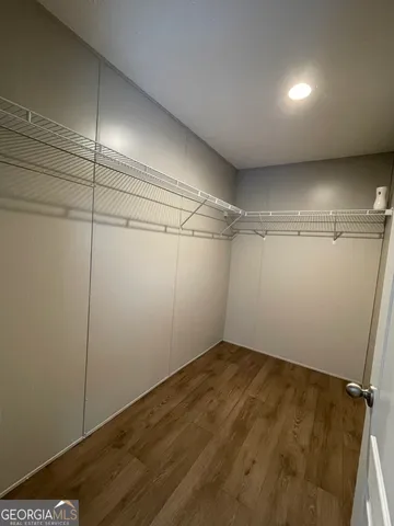 a view of a lake with a yard