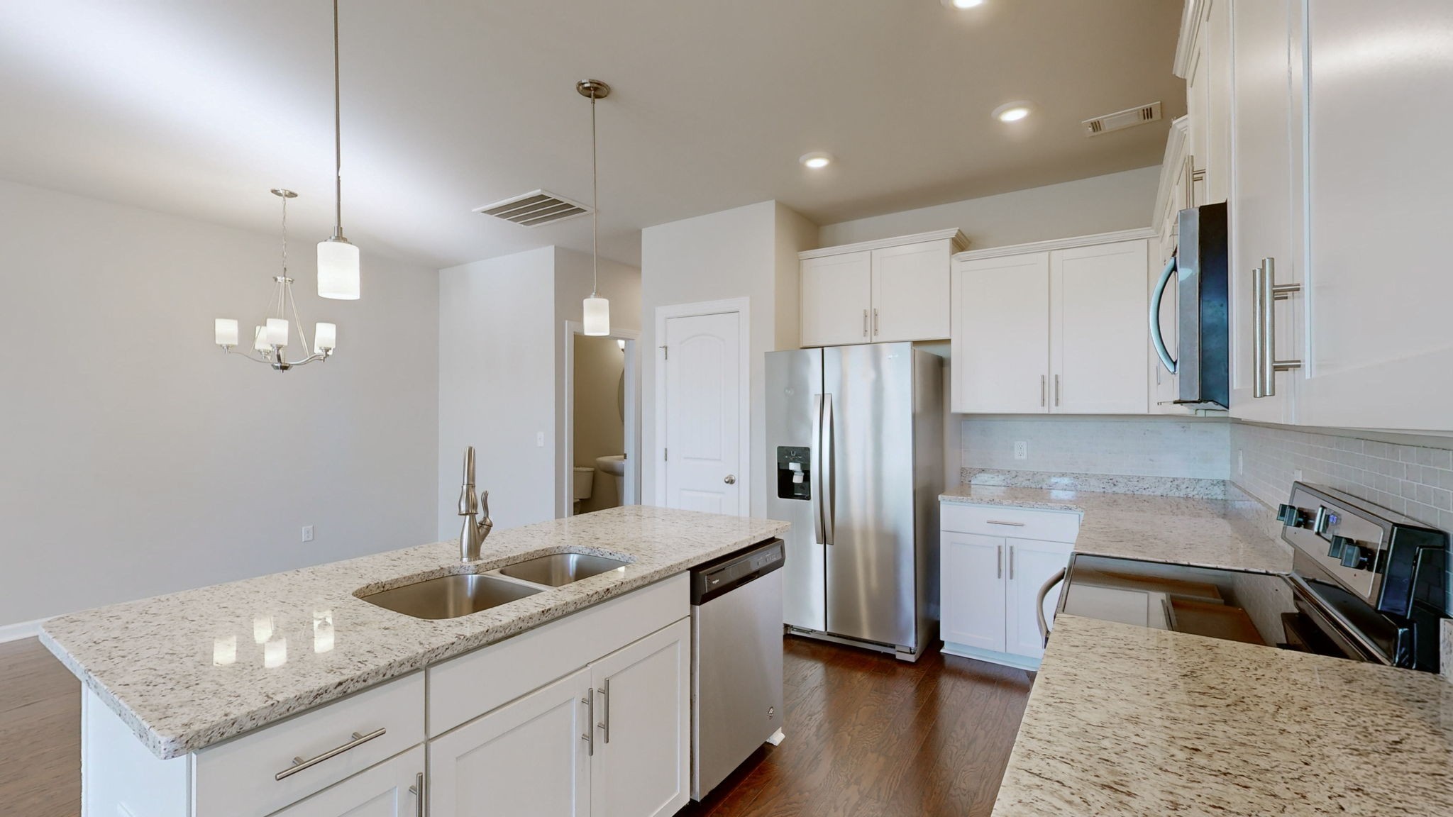 2815 Haversack Circle Murfreesboro, TN 37128 - Photo 2 of 12 a kitchen with stainless steel appliances granite countertop a sink a refrigerator and a granite counter tops