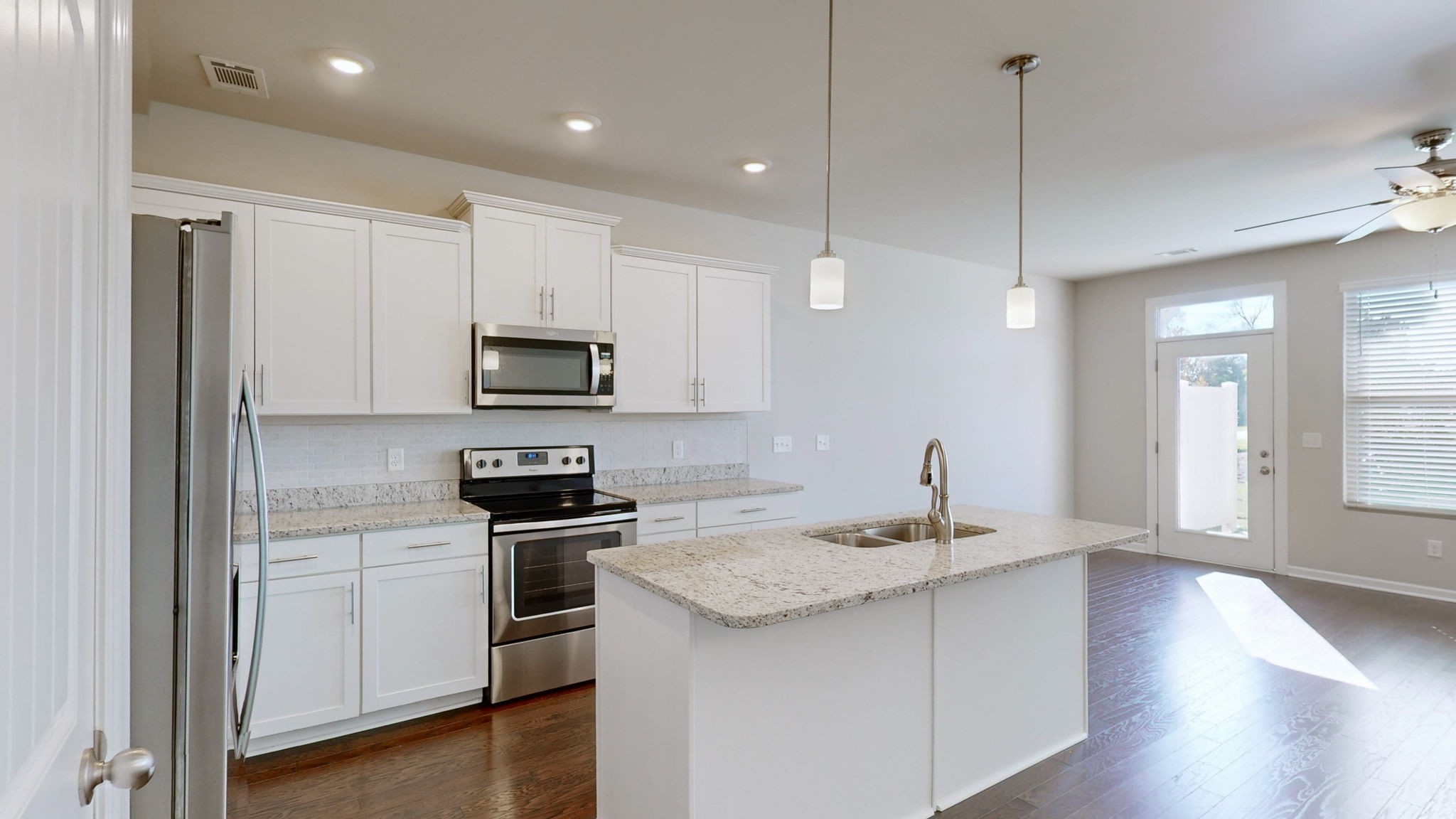 2815 Haversack Circle Murfreesboro, TN 37128 - Photo 4 of 12 a kitchen with stainless steel appliances granite countertop a stove a sink and a refrigerator