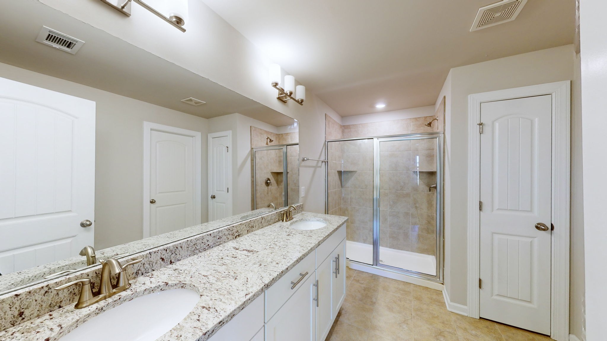 2815 Haversack Circle Murfreesboro, TN 37128 - Photo 6 of 12 a bathroom with a granite countertop sink a shower and a mirror