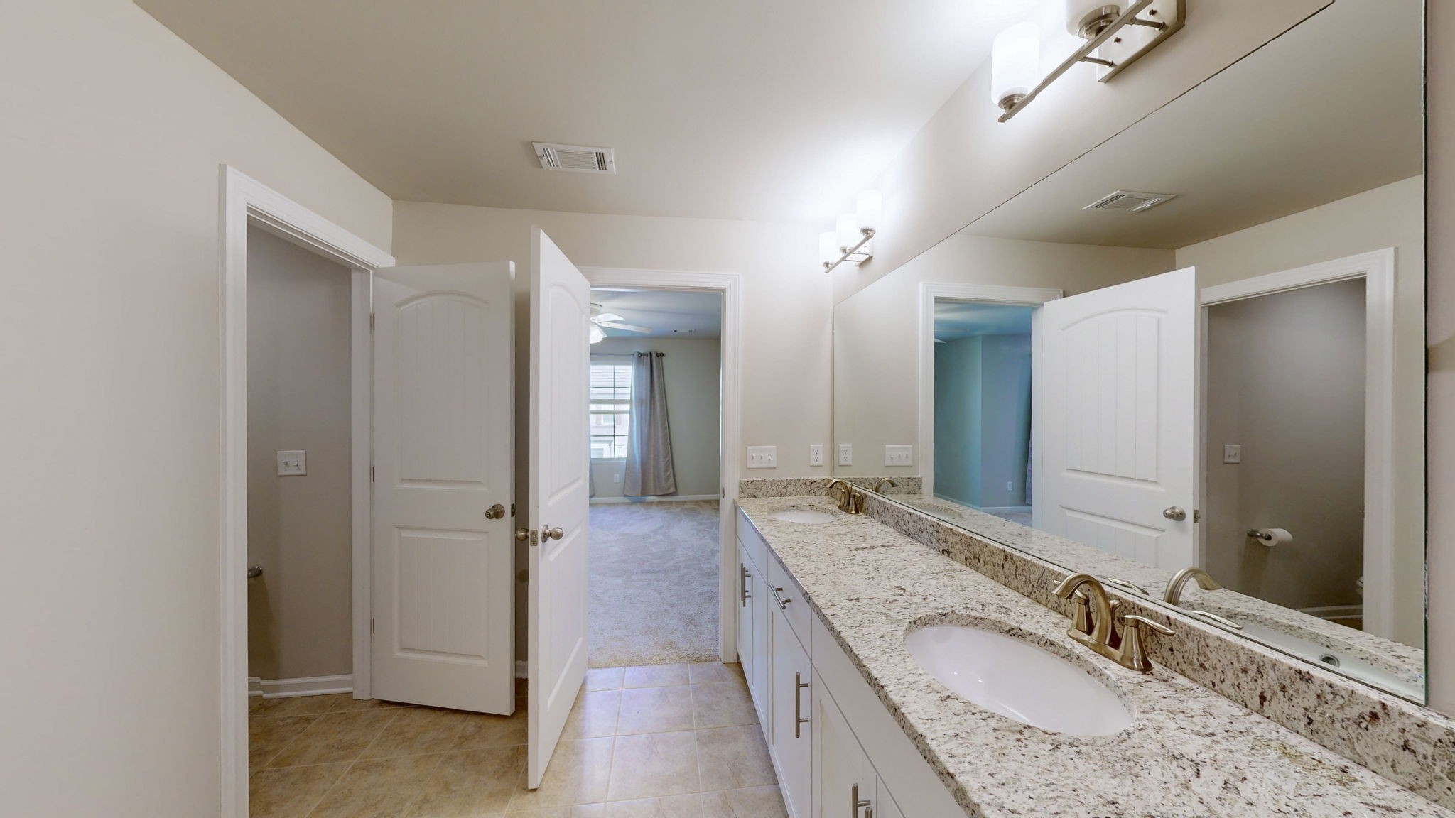 2815 Haversack Circle Murfreesboro, TN 37128 - Photo 8 of 12 a spacious bathroom with a granite countertop sink mirror and shower