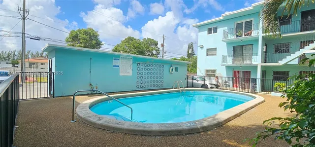 a view of outdoor space swimming pool and patio