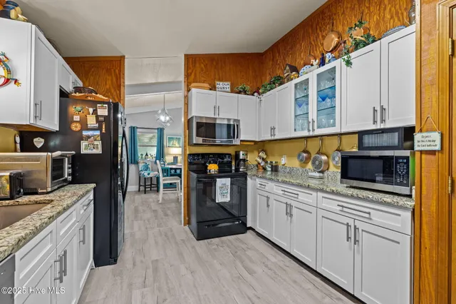 $975,000 | 201 Hoop Pole Creek Drive, Atlantic Beach, NC 28512