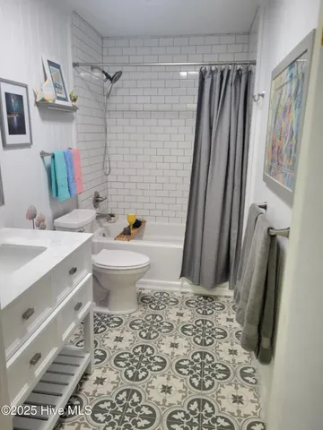 $975,000 | 201 Hoop Pole Creek Drive, Atlantic Beach, NC 28512