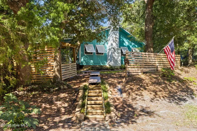 $975,000 | 201 Hoop Pole Creek Drive, Atlantic Beach, NC 28512