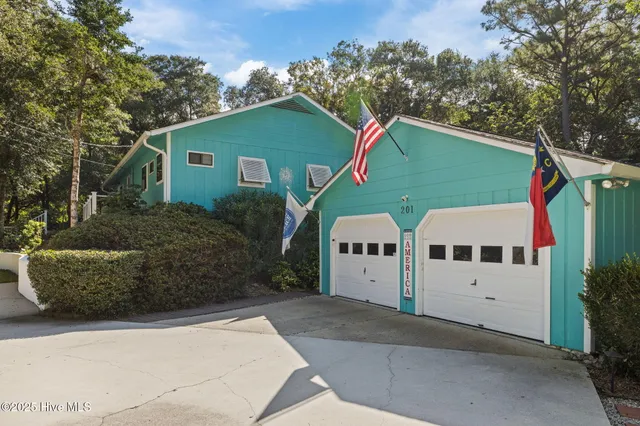 $975,000 | 201 Hoop Pole Creek Drive, Atlantic Beach, NC 28512