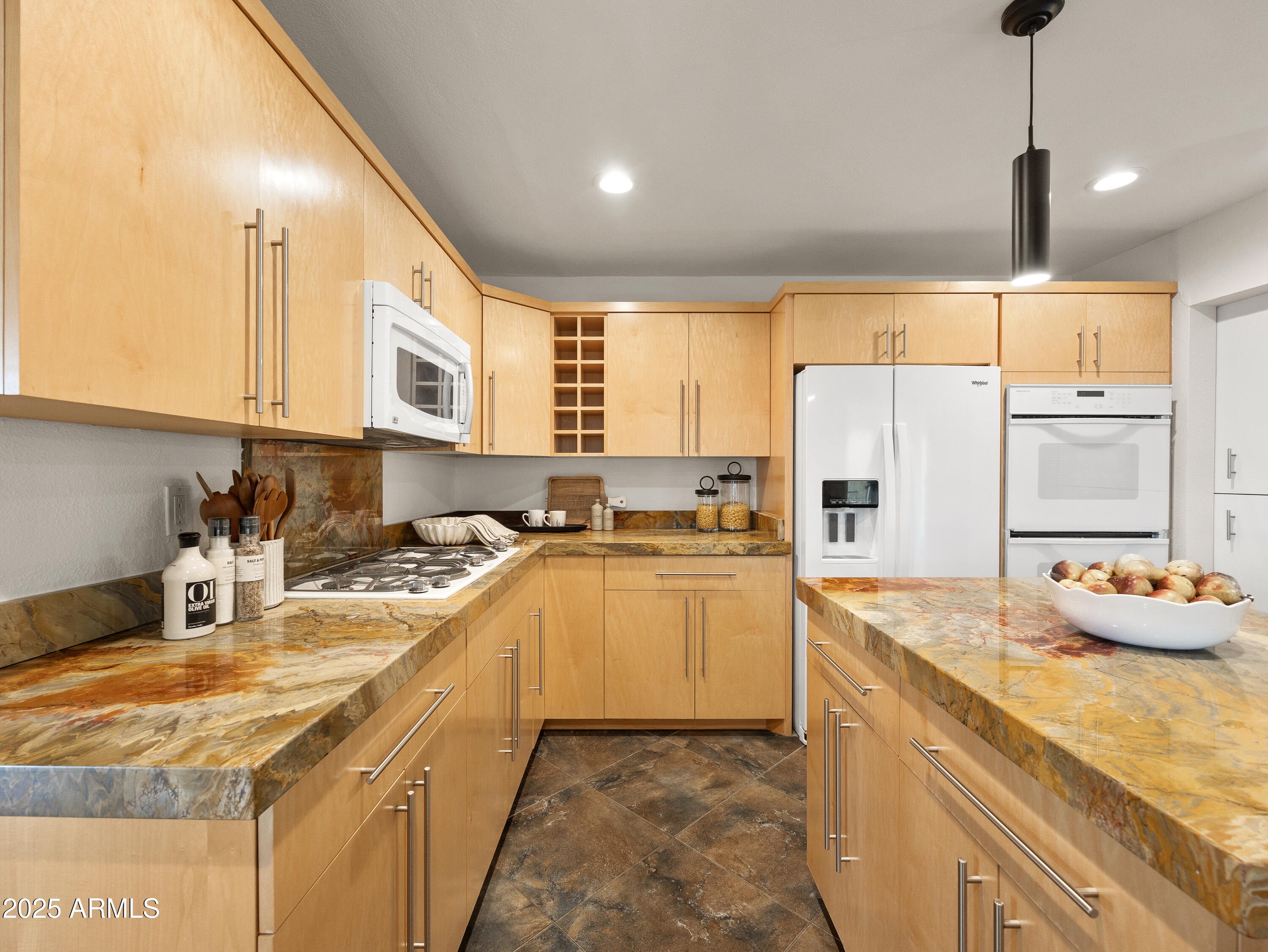 1836 East Turquoise Avenue Phoenix, AZ 85020 - Photo 18 of 63 a kitchen with sink a refrigerator and cabinets