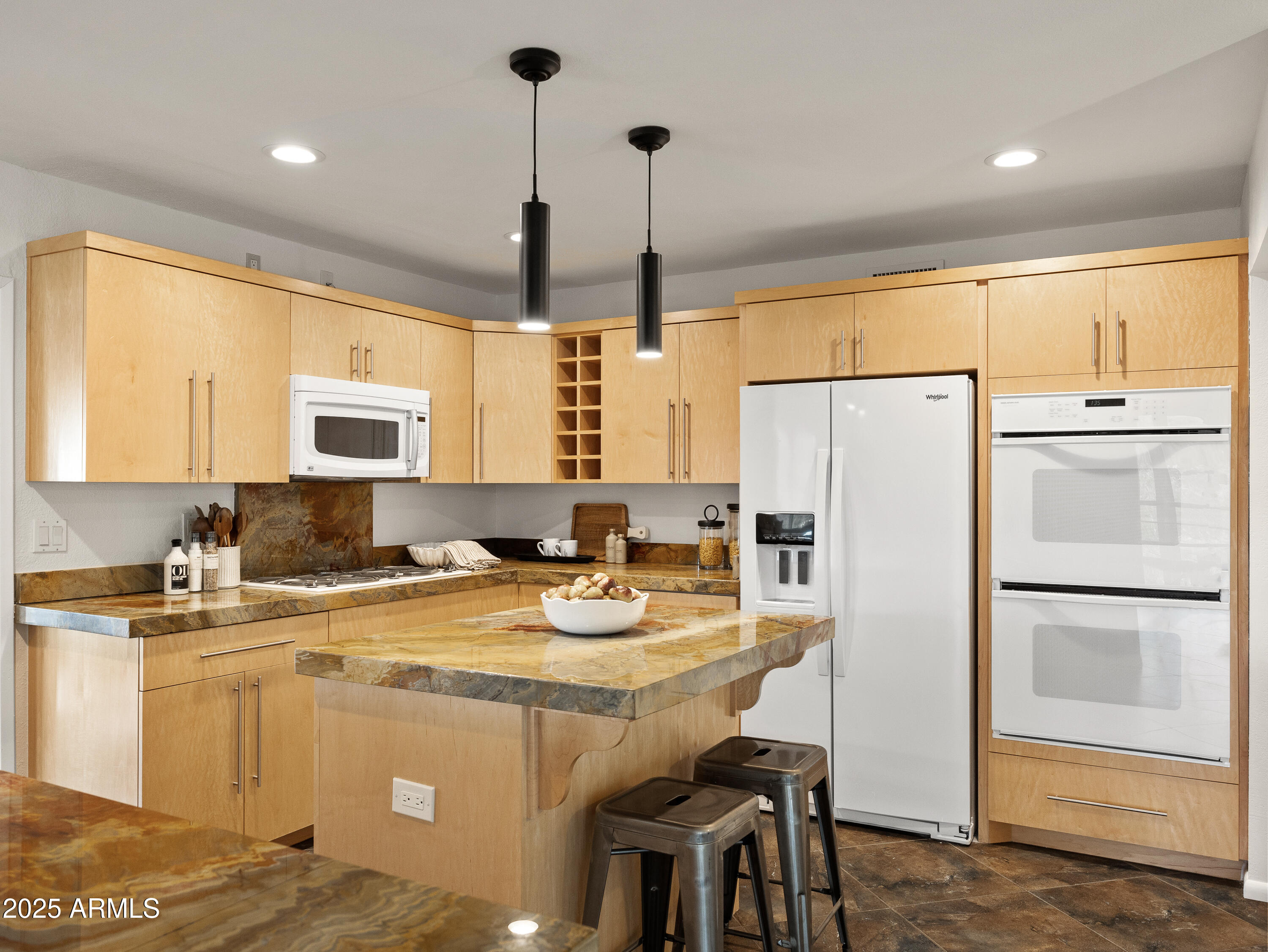 1836 East Turquoise Avenue Phoenix, AZ 85020 - Photo 19 of 63 a kitchen with refrigerator cabinets and wooden floor