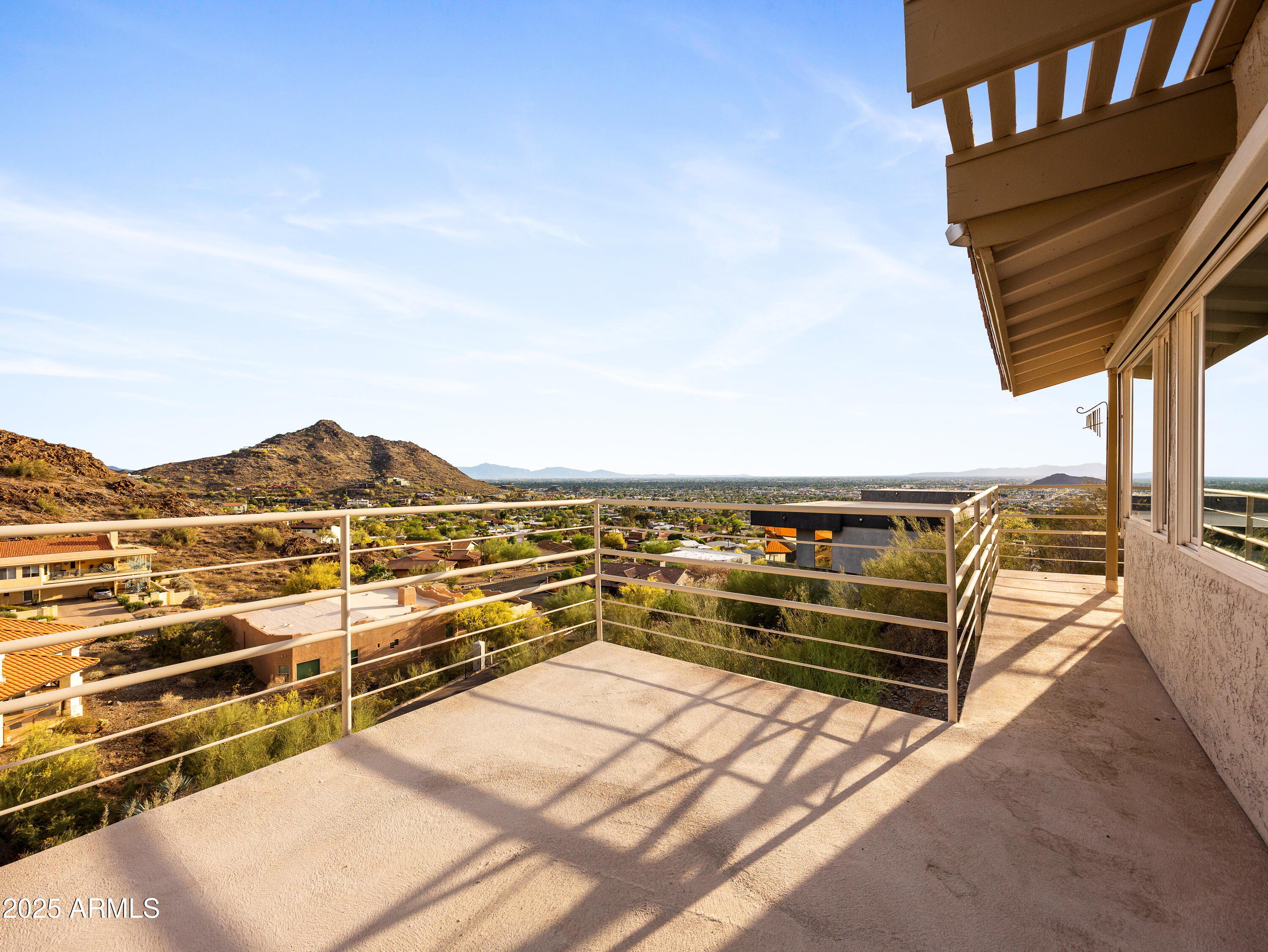 1836 East Turquoise Avenue Phoenix, AZ 85020 - Photo 46 of 63 a view of a terrace with a bench
