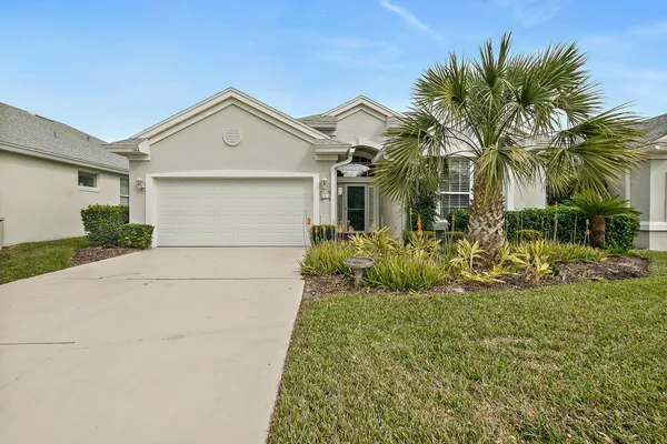a view of backyard of a house