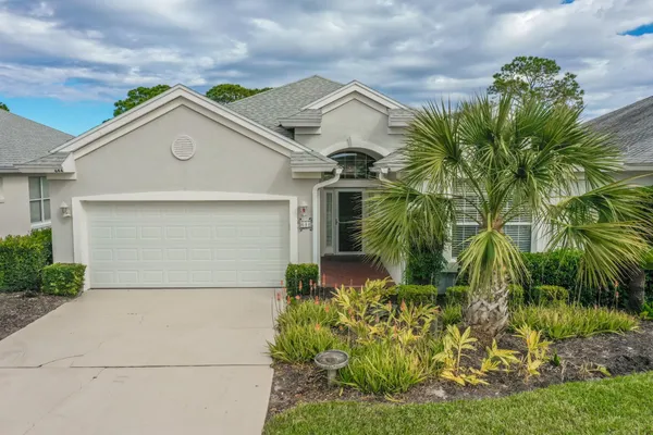 a view of front door and yard
