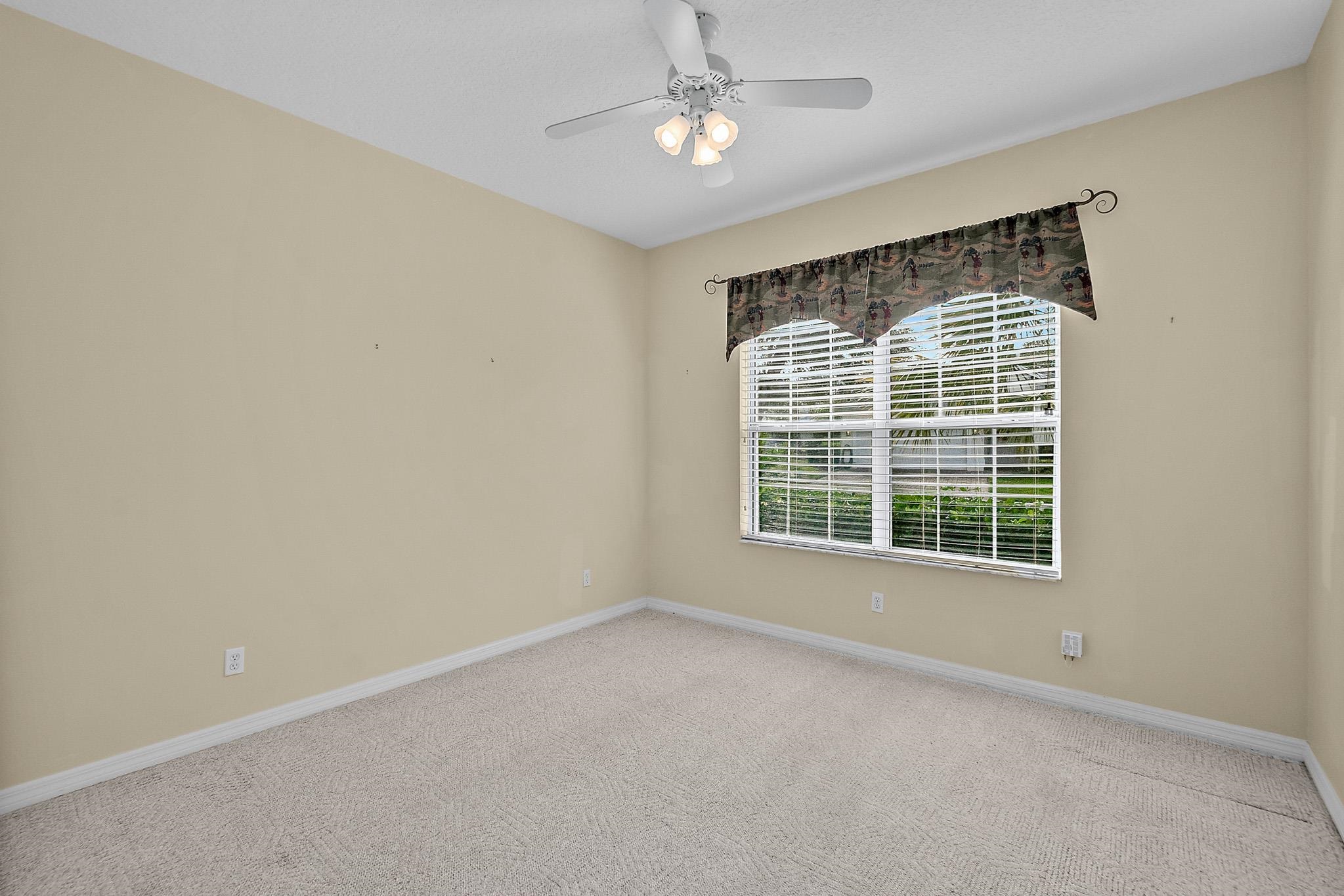 644 Casa Fuerta Lane St. Augustine, FL 32080 - Photo 21 of 49 a view of an empty room with a window
