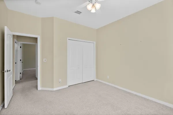 an empty room with a bathroom