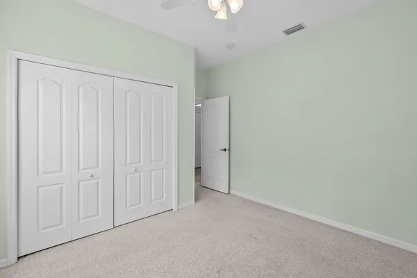 an empty room with a hallway