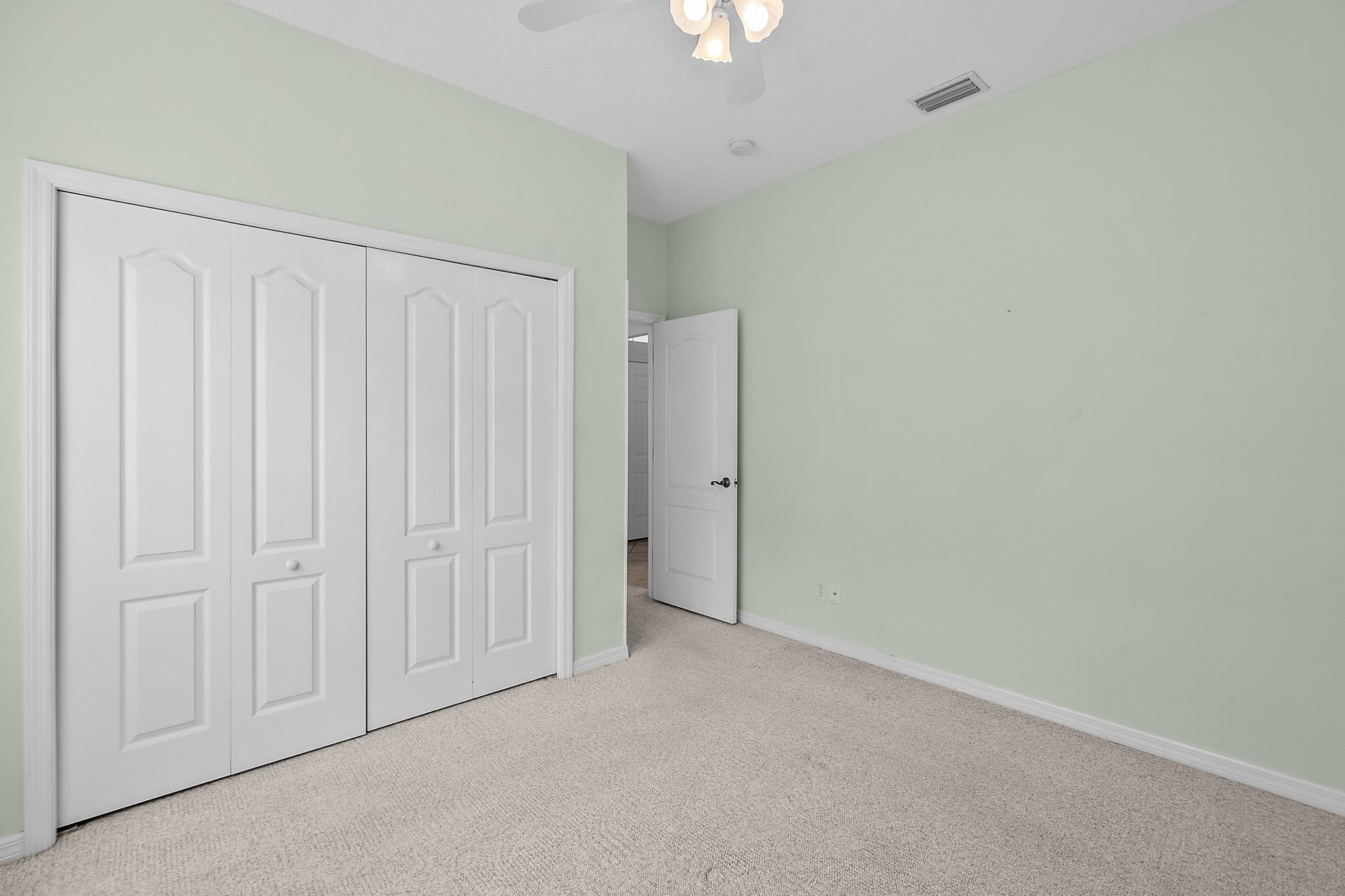 644 Casa Fuerta Lane St. Augustine, FL 32080 - Photo 25 of 49 an empty room with a hallway