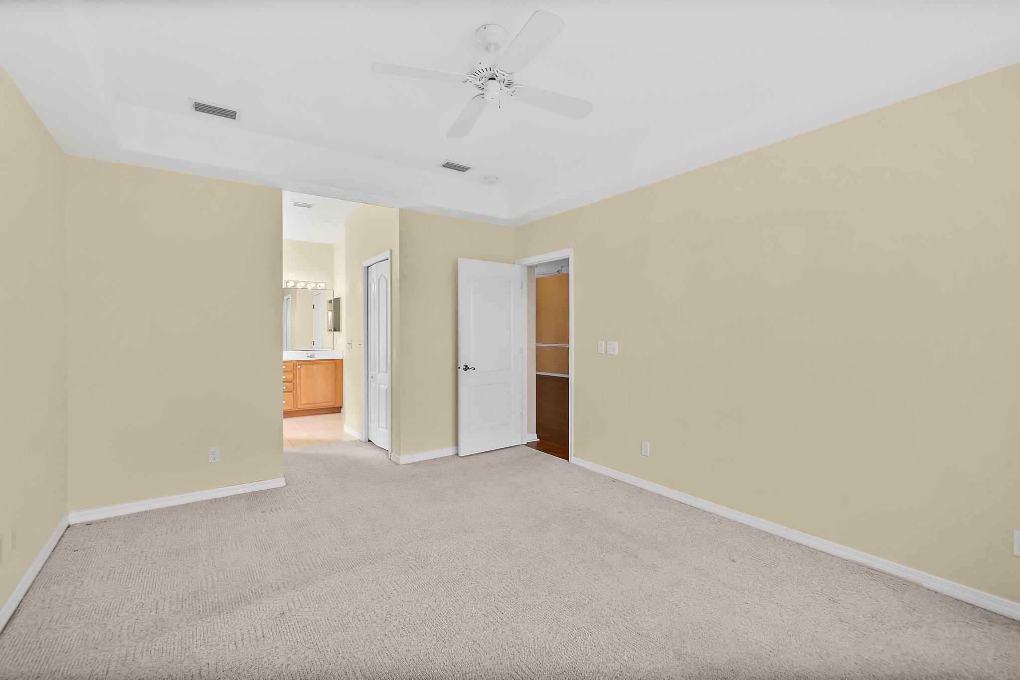 644 Casa Fuerta Lane St. Augustine, FL 32080 - Photo 28 of 49 a view of an empty room and a ceiling fan