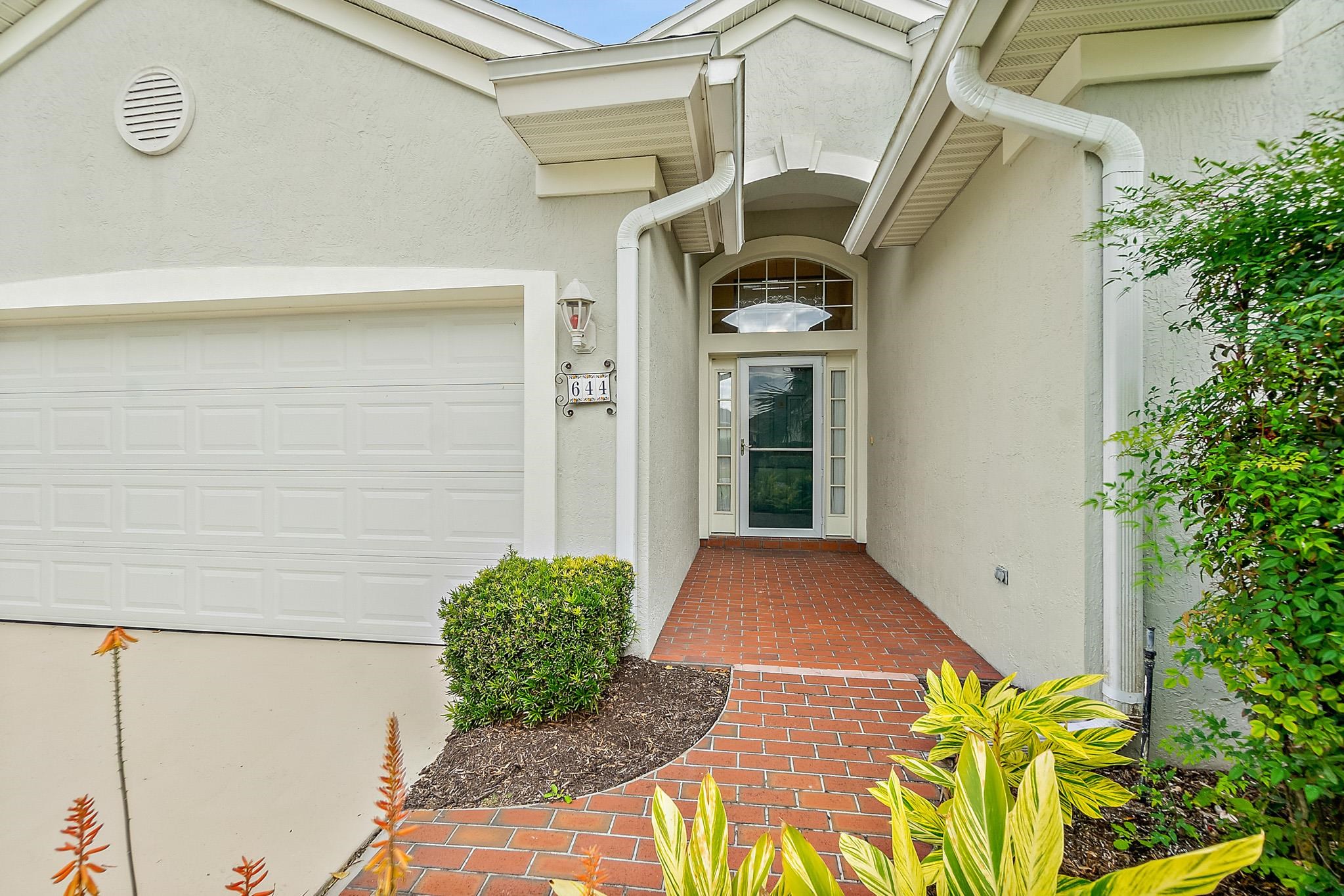644 Casa Fuerta Lane St. Augustine, FL 32080 - Photo 4 of 49 a view of front door and porch