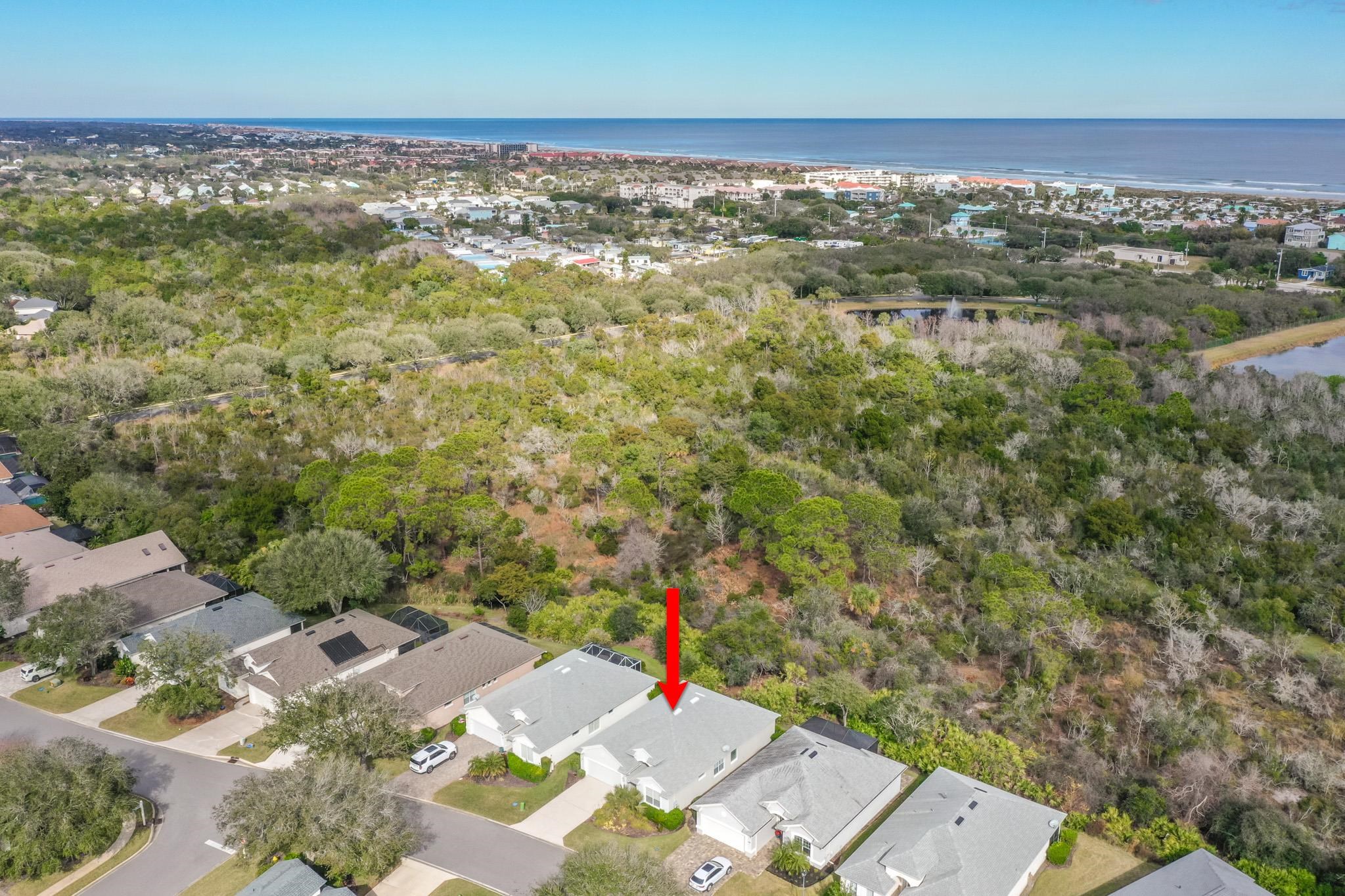 644 Casa Fuerta Lane St. Augustine, FL 32080 - Photo 43 of 49 an aerial view of residential houses with outdoor space and trees