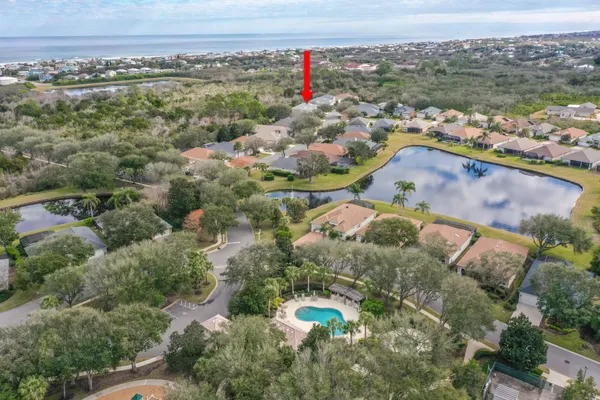 an aerial view of a houses with a outdoor space