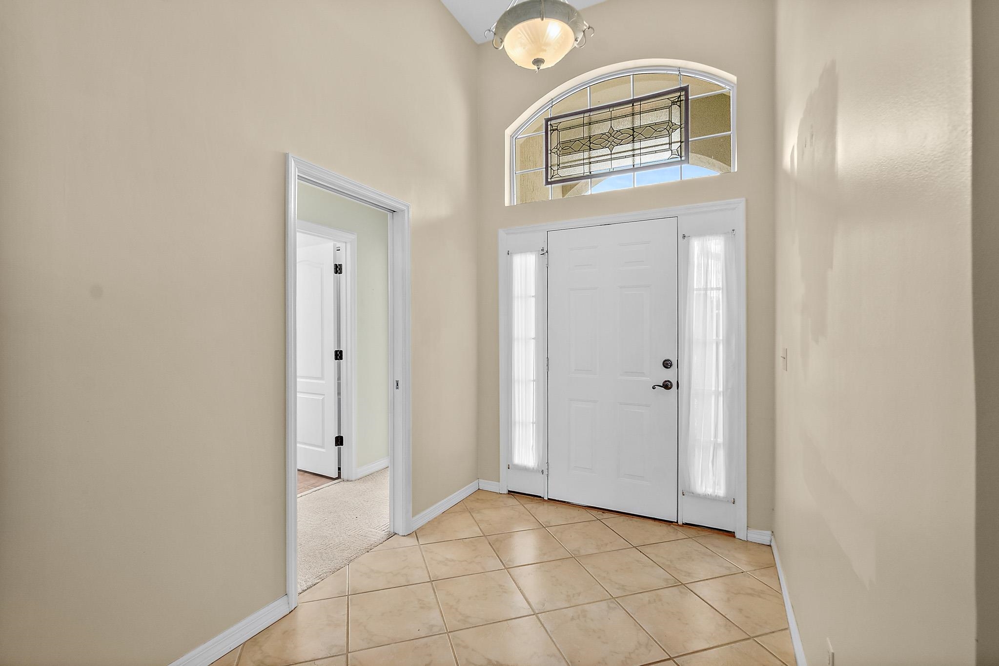 644 Casa Fuerta Lane St. Augustine, FL 32080 - Photo 6 of 49 a view of a hallway with front door