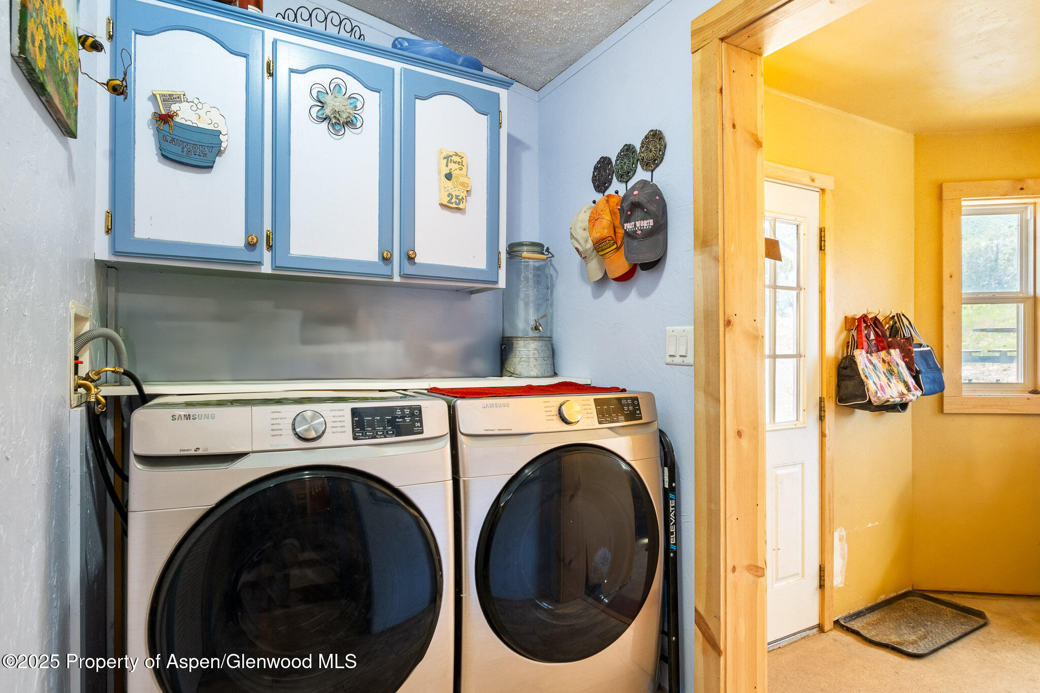 3768 County Road 237 Rifle, CO 81650 - Photo 15 of 47 a utility room with dryer and washer