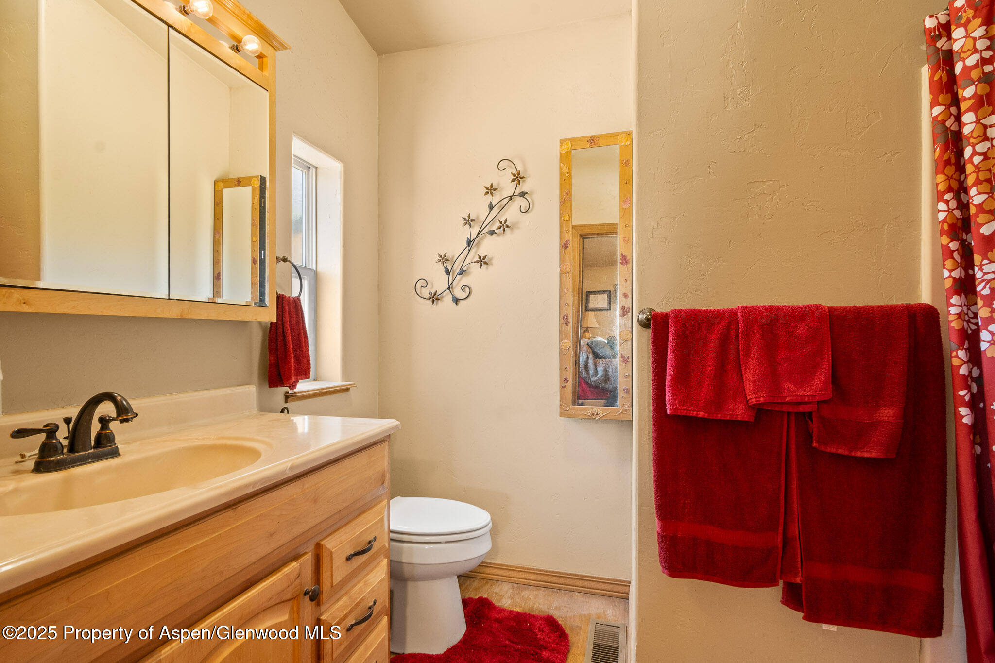 3768 County Road 237 Rifle, CO 81650 - Photo 20 of 47 a bathroom with a sink and a mirror