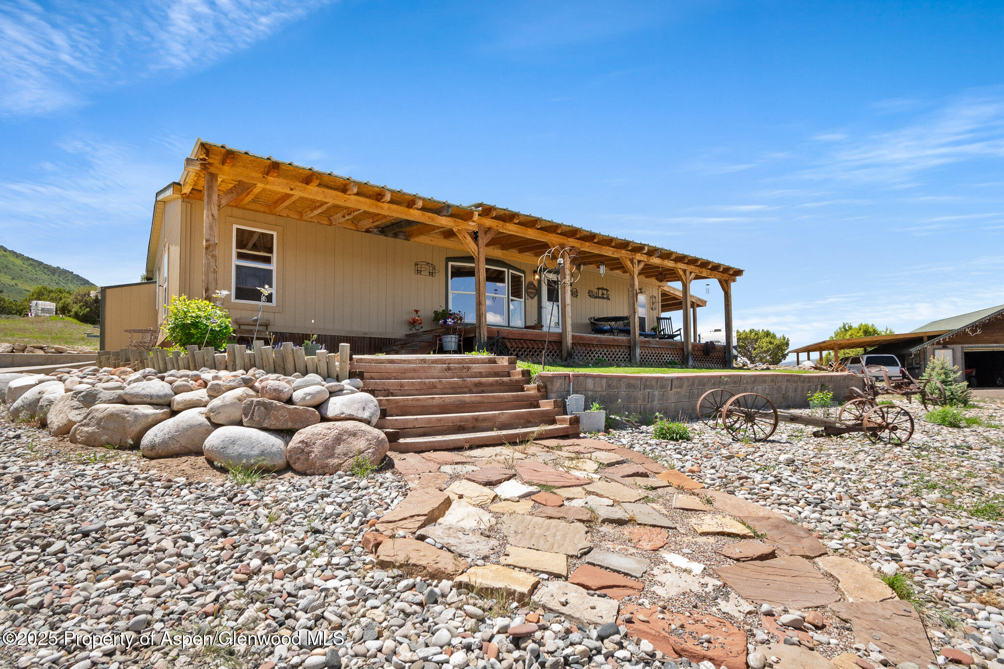 3768 County Road 237 Rifle, CO 81650 - Photo 2 of 47 a front view of house with a yard